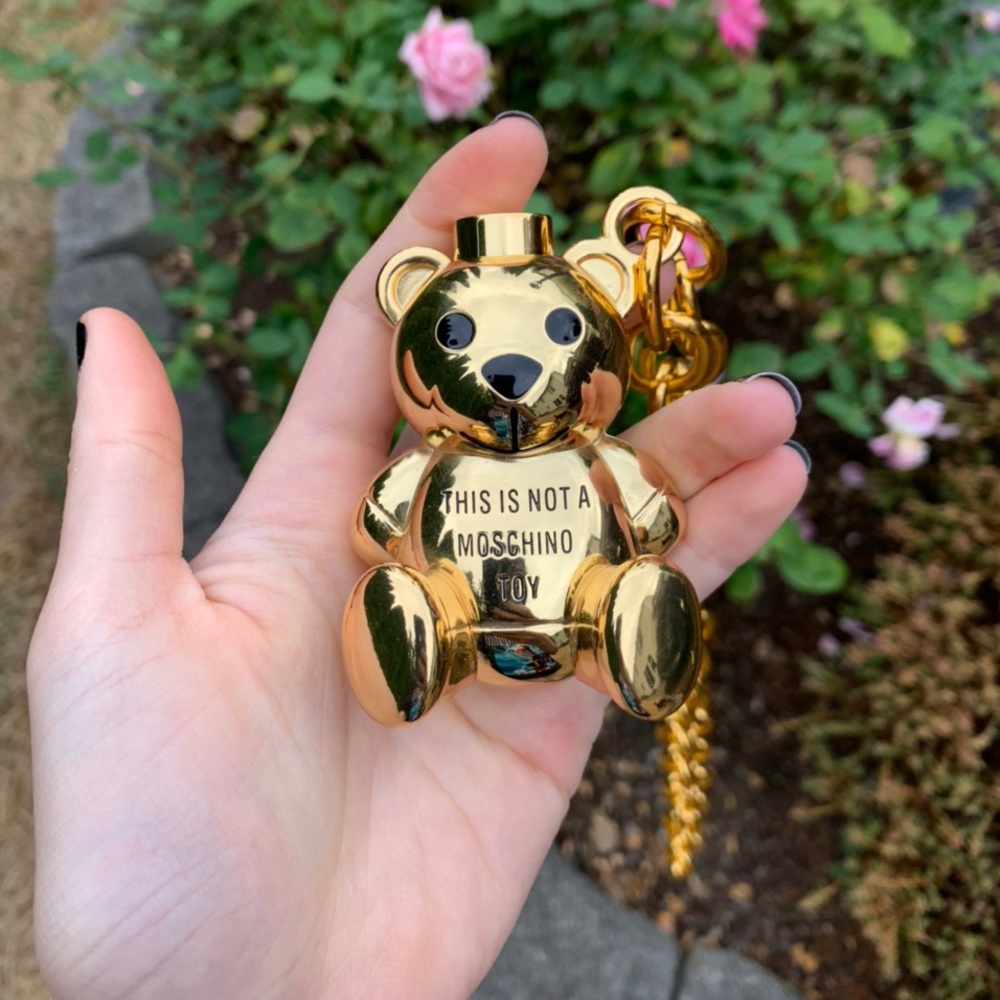 Moschino x Sephora necklace and lipgloss